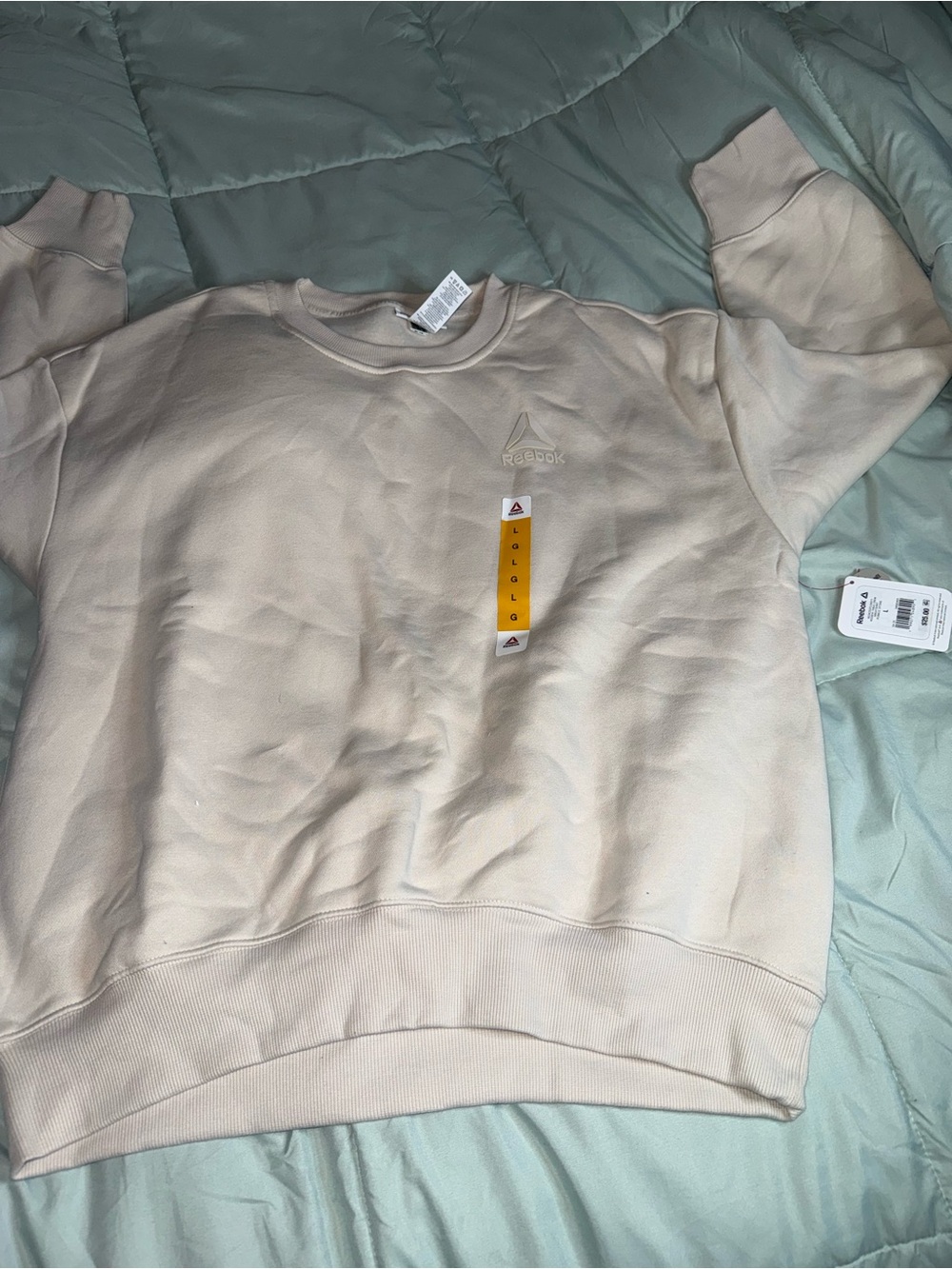 Reebok women’s Cream Crewneck Pullover
